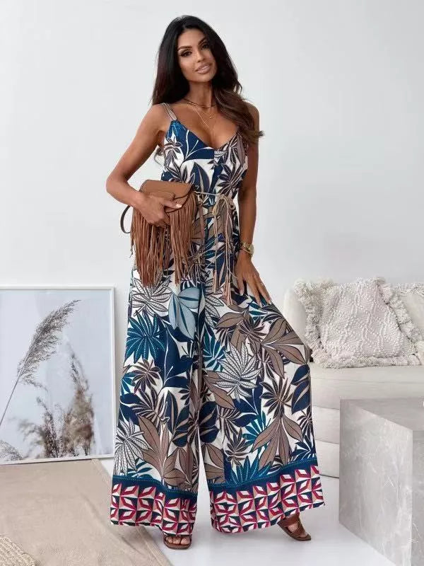 Paisley patterned tied wide-leg romper in Peacock Blue with a tropical print and belted waist.