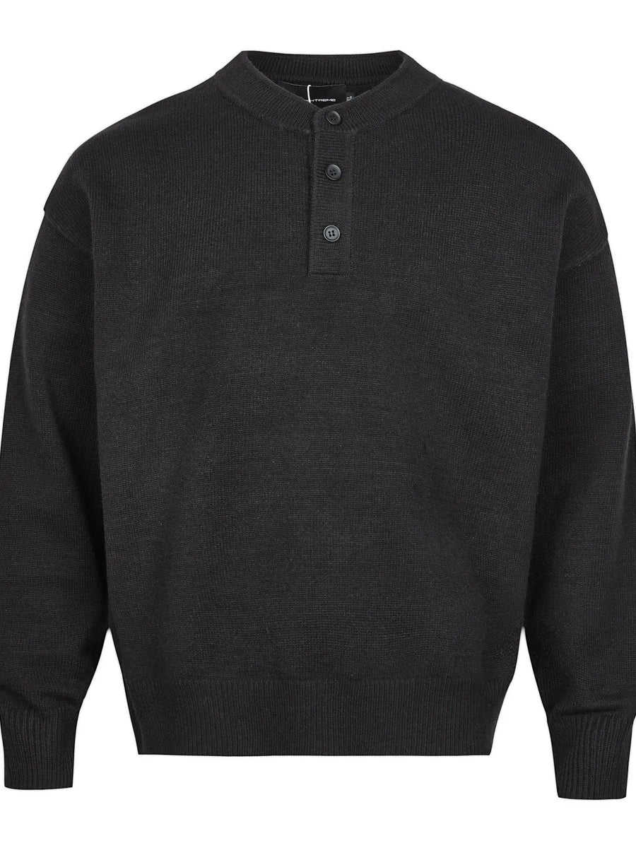 Black button detail drop shoulder sweater with a band collar.