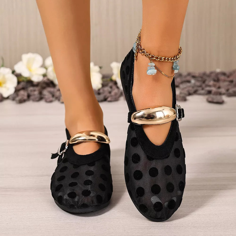 slip-on flats in black featuring mesh upper and regular fit
