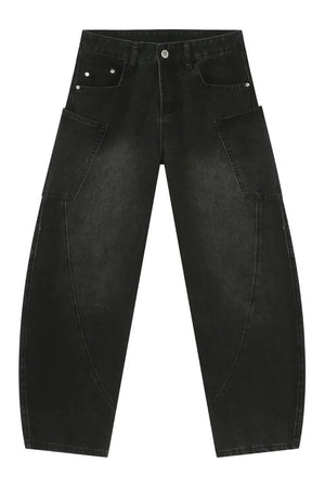 Black denim baggy trousers with unique paneling and cargo pockets.