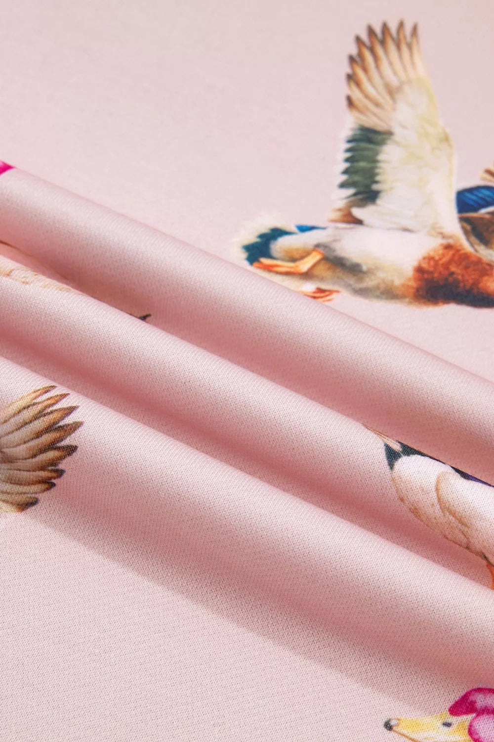 light pink relaxed sweatshirt with crew neck