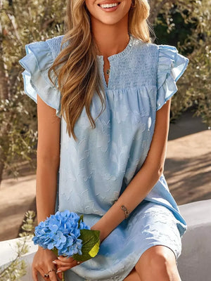 Sky blue floral embossed mini dress with smocked bodice and ruffled sleeves.