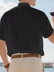 Black relaxed-fit men's overshirt with band collar and button detail.