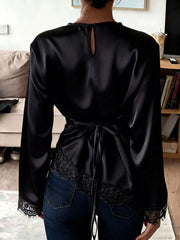 White relaxed blouse with round neck