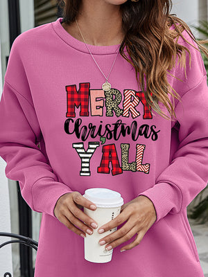 Oversized crewneck sweatshirt in Moonlit Mauve with "Merry Christmas Y'all" graphic in plaid, leopard and chevron patterns.