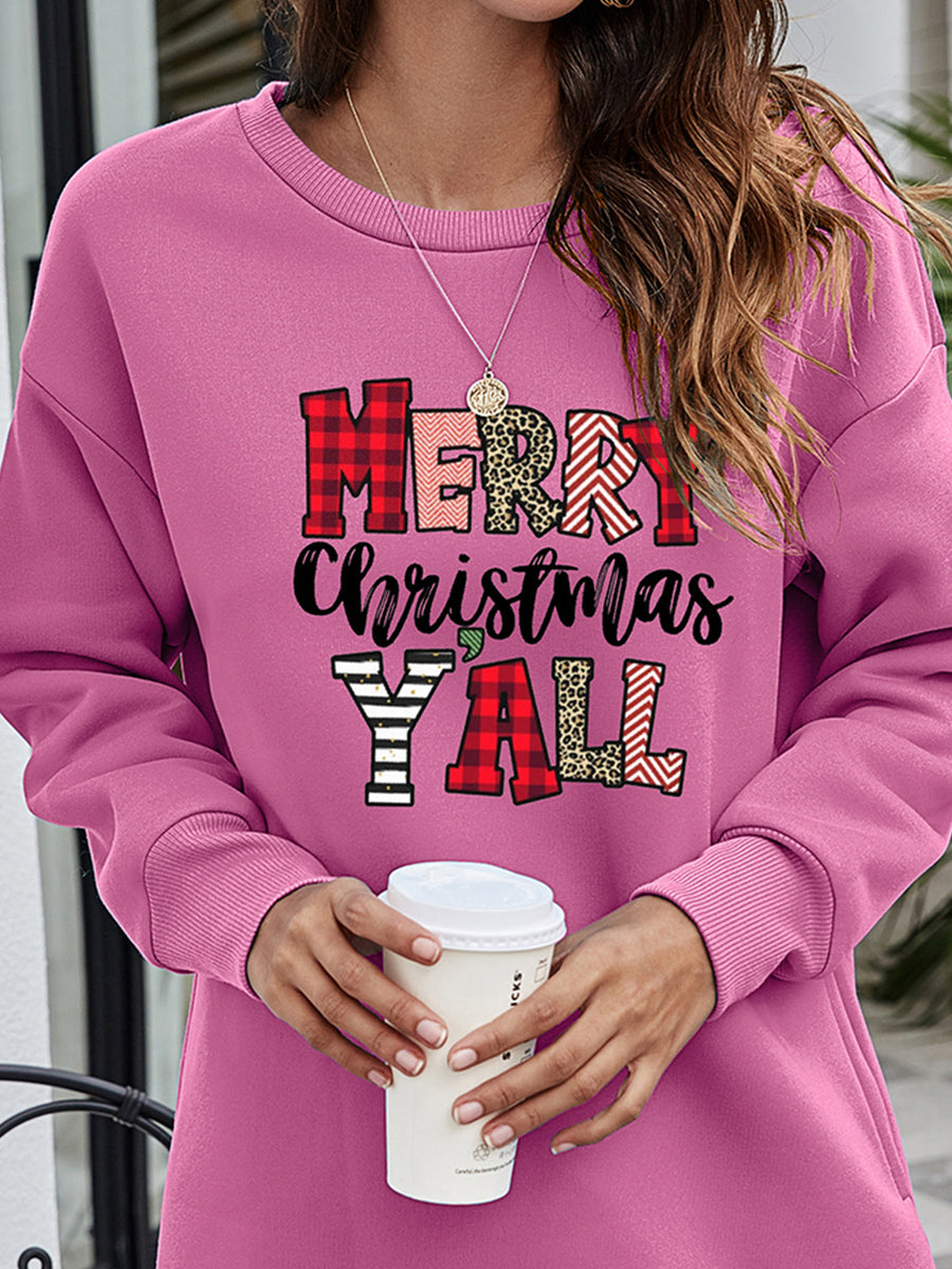 Oversized crewneck sweatshirt in Moonlit Mauve with "Merry Christmas Y'all" graphic in plaid, leopard and chevron patterns.