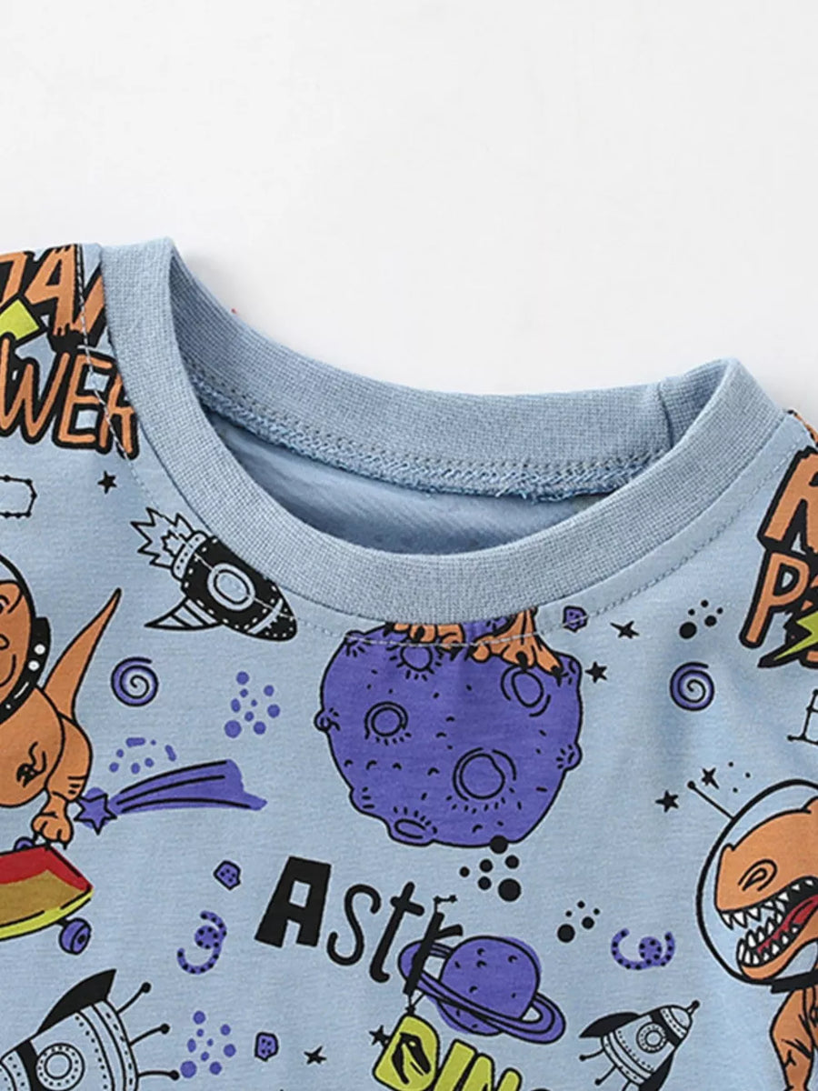 Light blue crewneck t-shirt with dinosaur and space print.