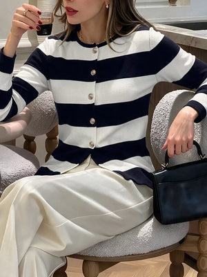 black cardigan with hip-length and button-front