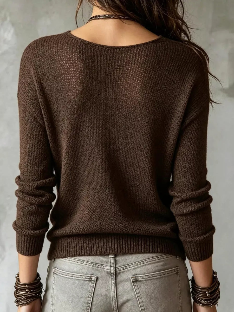 100% polyester Care instructions: Machine wash cold pullover sweater in dark brown with relaxed silhouette