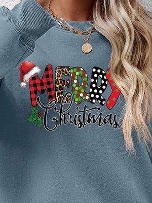 Festive graphic sweatshirt in Misty Blue with Merry Christmas text and Santa hat detail.