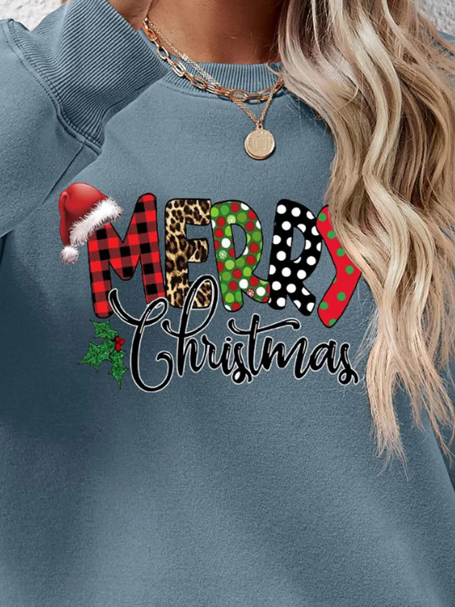 Festive graphic sweatshirt in Misty Blue with Merry Christmas text and Santa hat detail.