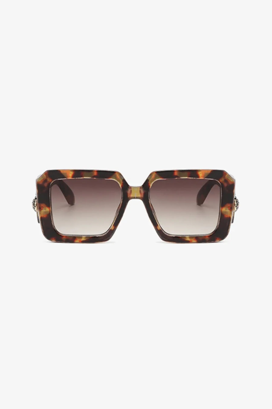 Geometric facet sunglasses in tortoise shell with embellished temples and gradient brown lenses.