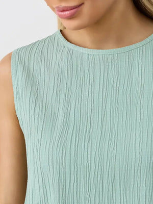 Light green textured cotton tank top with crew neck and sleeveless design