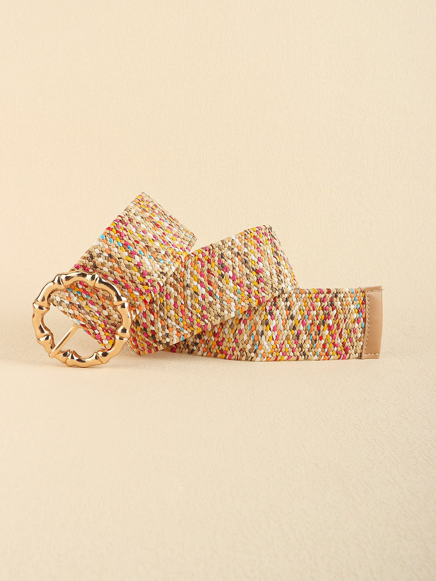 Woven raffia belt in multicolor with a sculpted gold bamboo buckle and tan leather end.