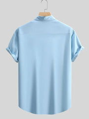 95%cotton, 5%spandex Care instructions: Machine wash cold button-up shirt in Pastel Blue with regular silhouette