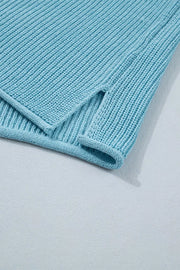 Relaxed blue ribbed knit sweater top with side slit detail