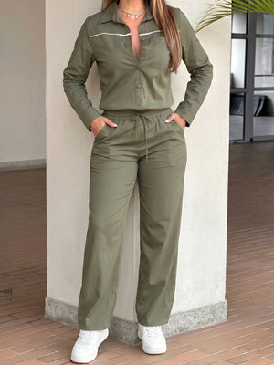 95% polyester, 5% elastane Care instructions: Machine wash cold jumpsuit in olive green with relaxed silhouette