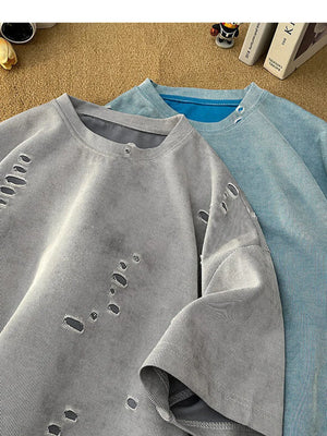 Men's oversized distressed t-shirt in gray cotton with ripped details.