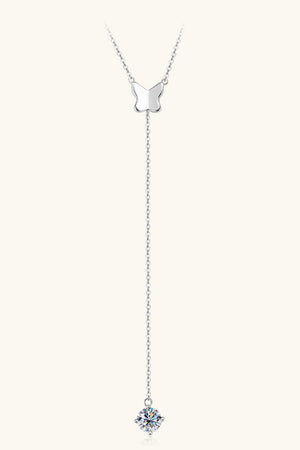 Silver lariat necklace with butterfly pendant and moissanite drop