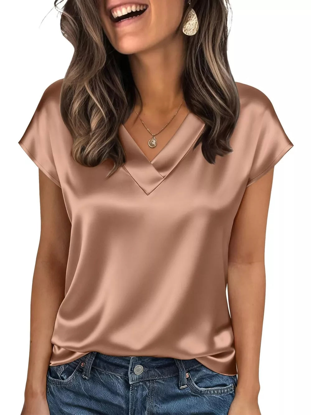 Champagne satin V-neck blouse with short sleeves, styled with jeans.