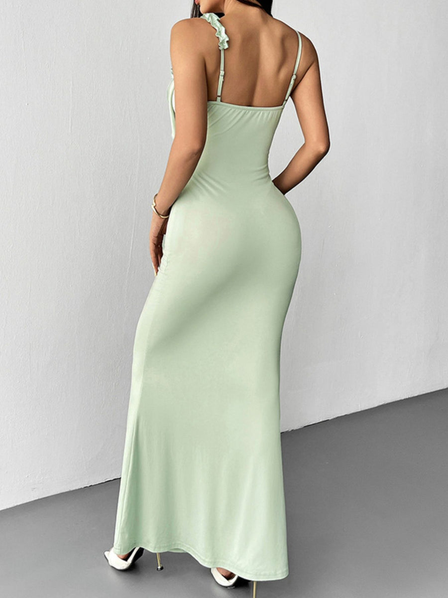 Light green ruffled mermaid maxi dress with spaghetti straps and a bodycon fit.
