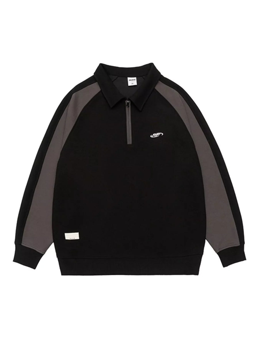Black raglan quarter zip sweatshirt with contrast gray sleeves and embroidered logo