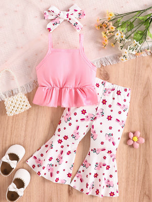 Pink ruffled tank top and white floral bunny flare pants set with matching headband.