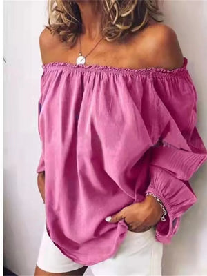 Pink off-the-shoulder maternity shirt with gathered neckline and frill detail on sleeves.