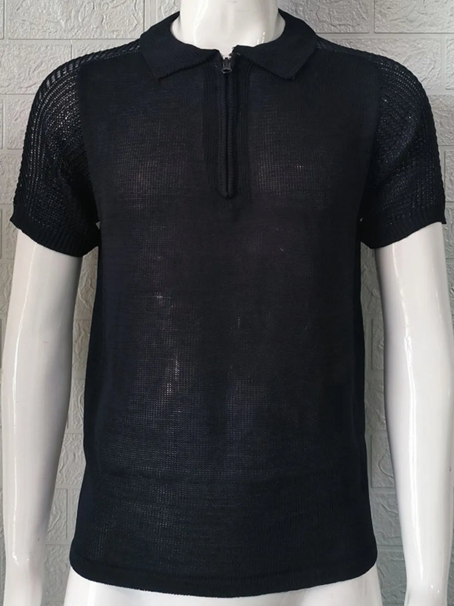 Black textured knit polo shirt with zip neck and short sleeves