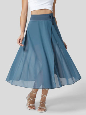 Flowy midi skirt in Lake Blue with drawstring waist and shorts liner.