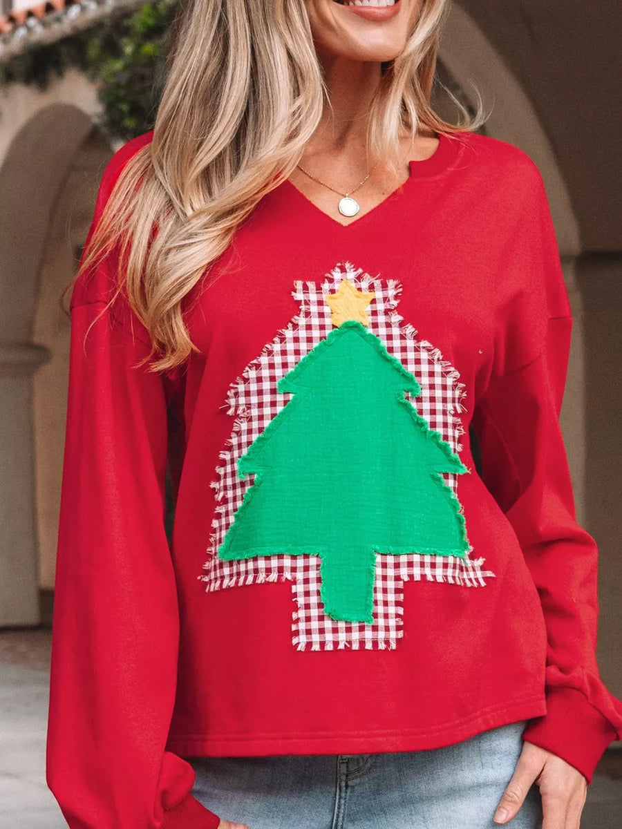 Red cotton sweatshirt with festive plaid Christmas tree applique and yellow star detail.