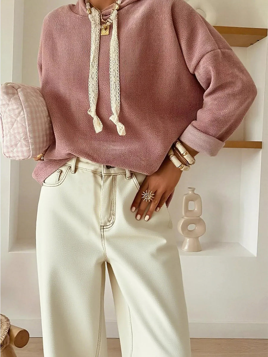 Dusty pink dropped shoulder hoodie with lace drawstring and rolled cuffs.