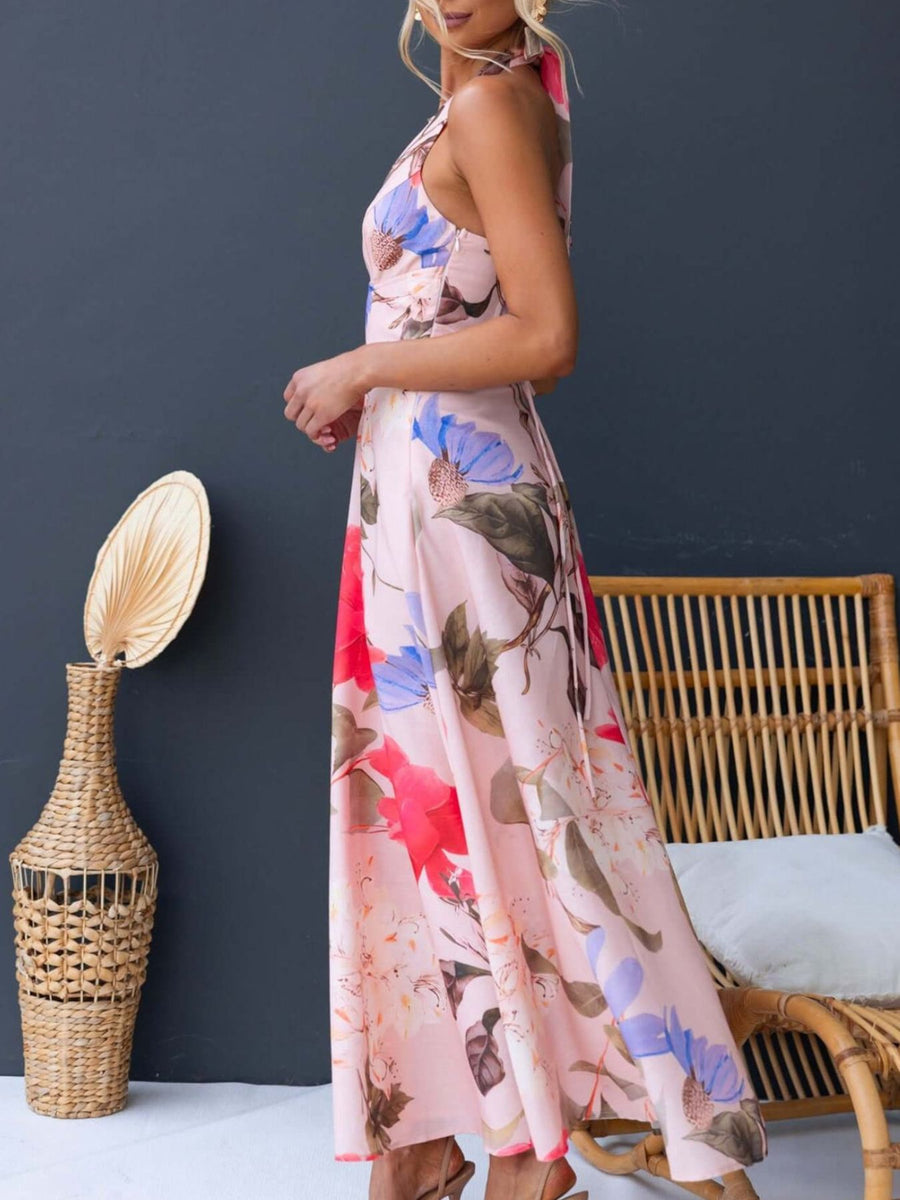 Pink floral halter neck maxi dress with a-line cut.