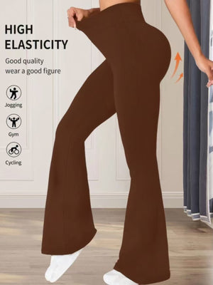 Premium high waist flare pants in brown cotton, showing high elasticity and a flattering fit.