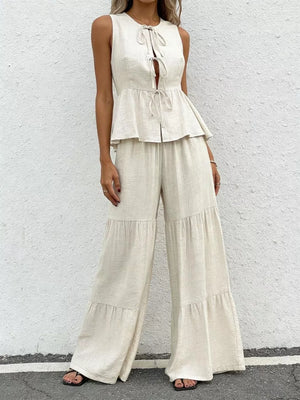 Beige ruffled tie-front sleeveless peplum top with tiered wide-leg pants set