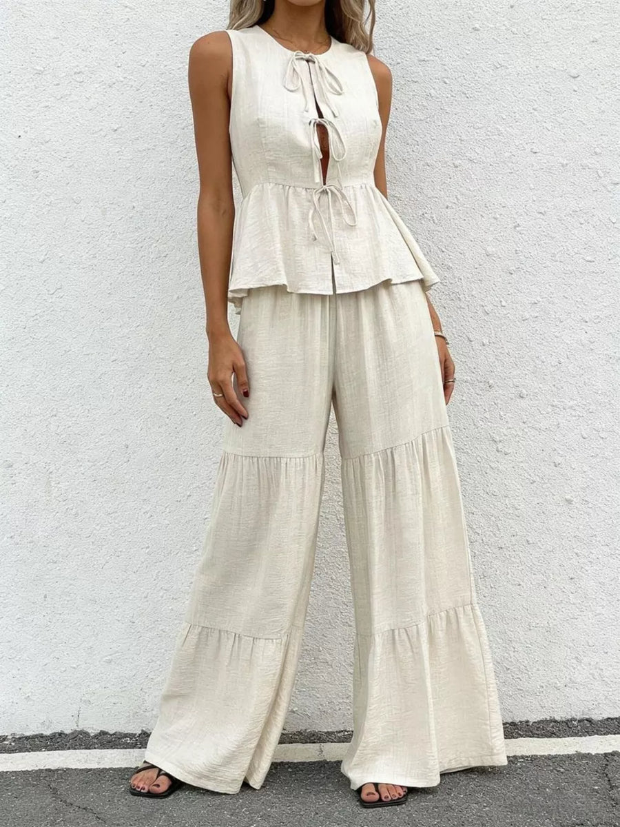 Beige ruffled tie-front sleeveless peplum top with tiered wide-leg pants set