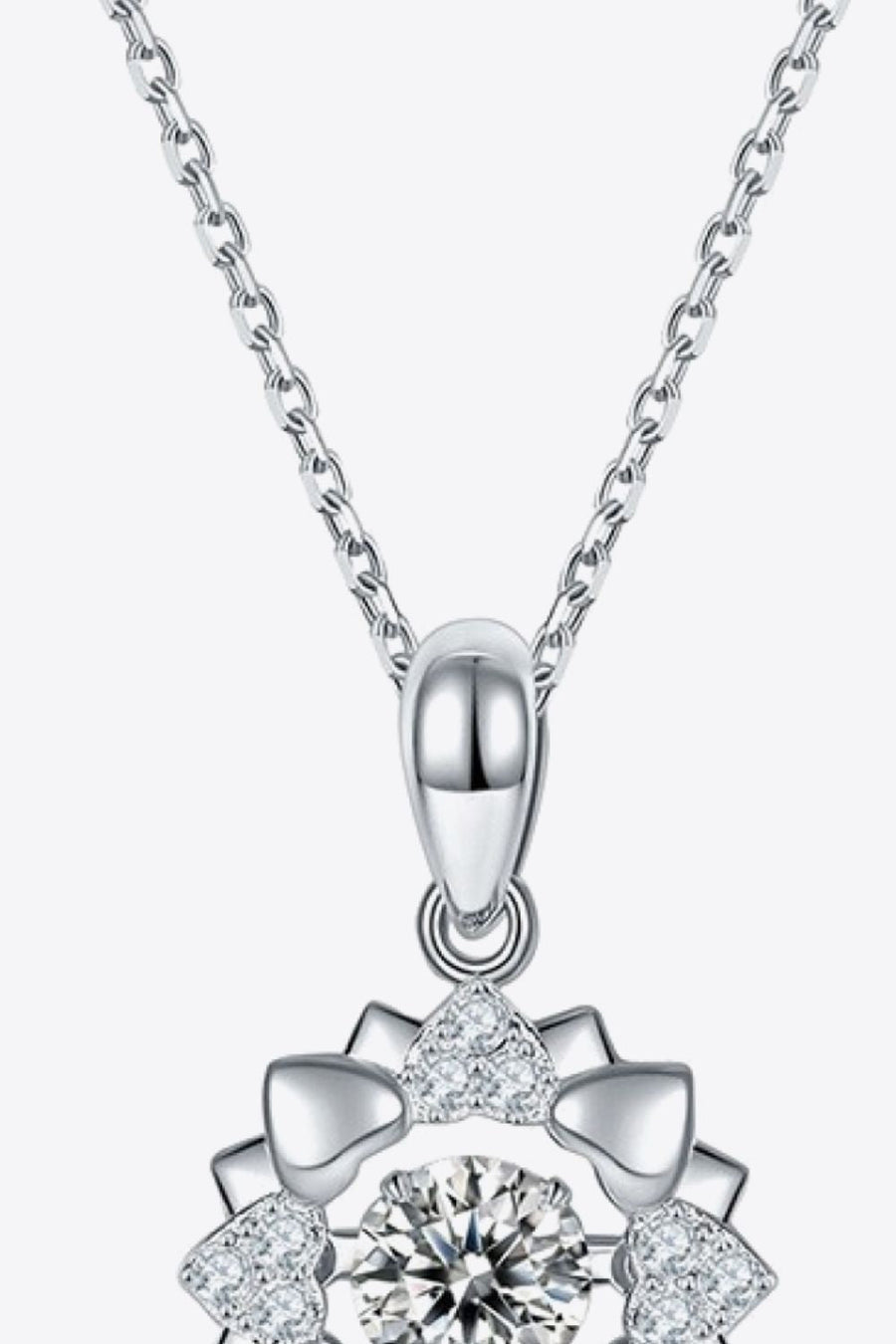 Silver diamond halo necklace with heart details on a sterling silver chain.