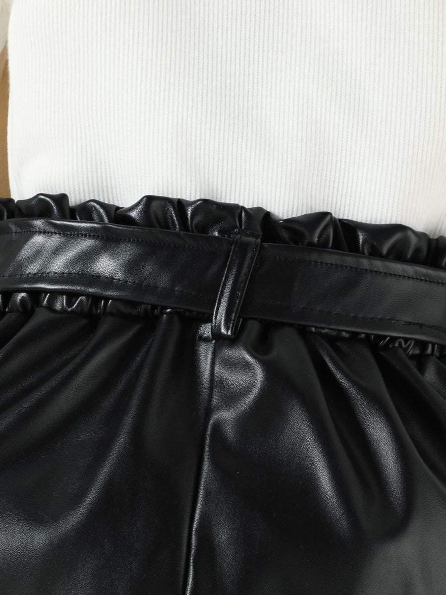 Black faux leather shorts with paperbag waist and belt detail