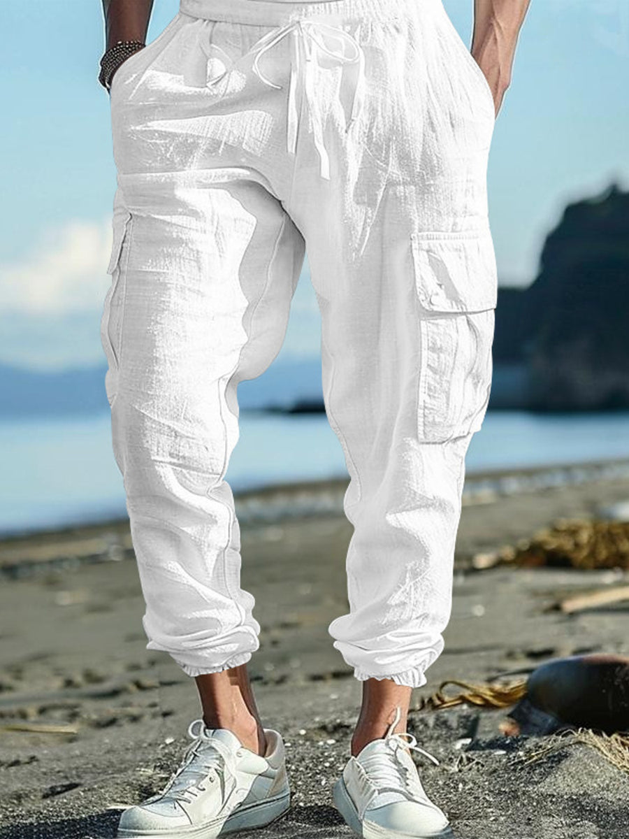 White cargo pants with drawstring waist and cuffed ankles