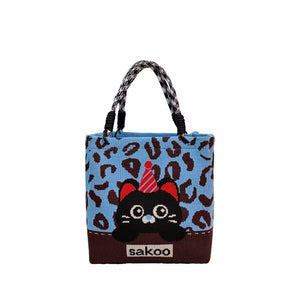 Cartoon graphic tote handbag in blue with leopard print and black cat design.
