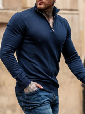 Navy slim fit quarter zip sweater with a metal zipper detail.