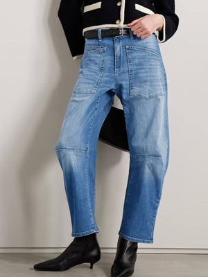 85% cotton, 15% polyester Care instructions: Machine wash cold wide-leg jeans in Black with wide-leg silhouette