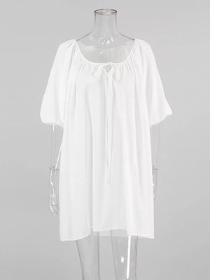 White mini dress with mini and tie