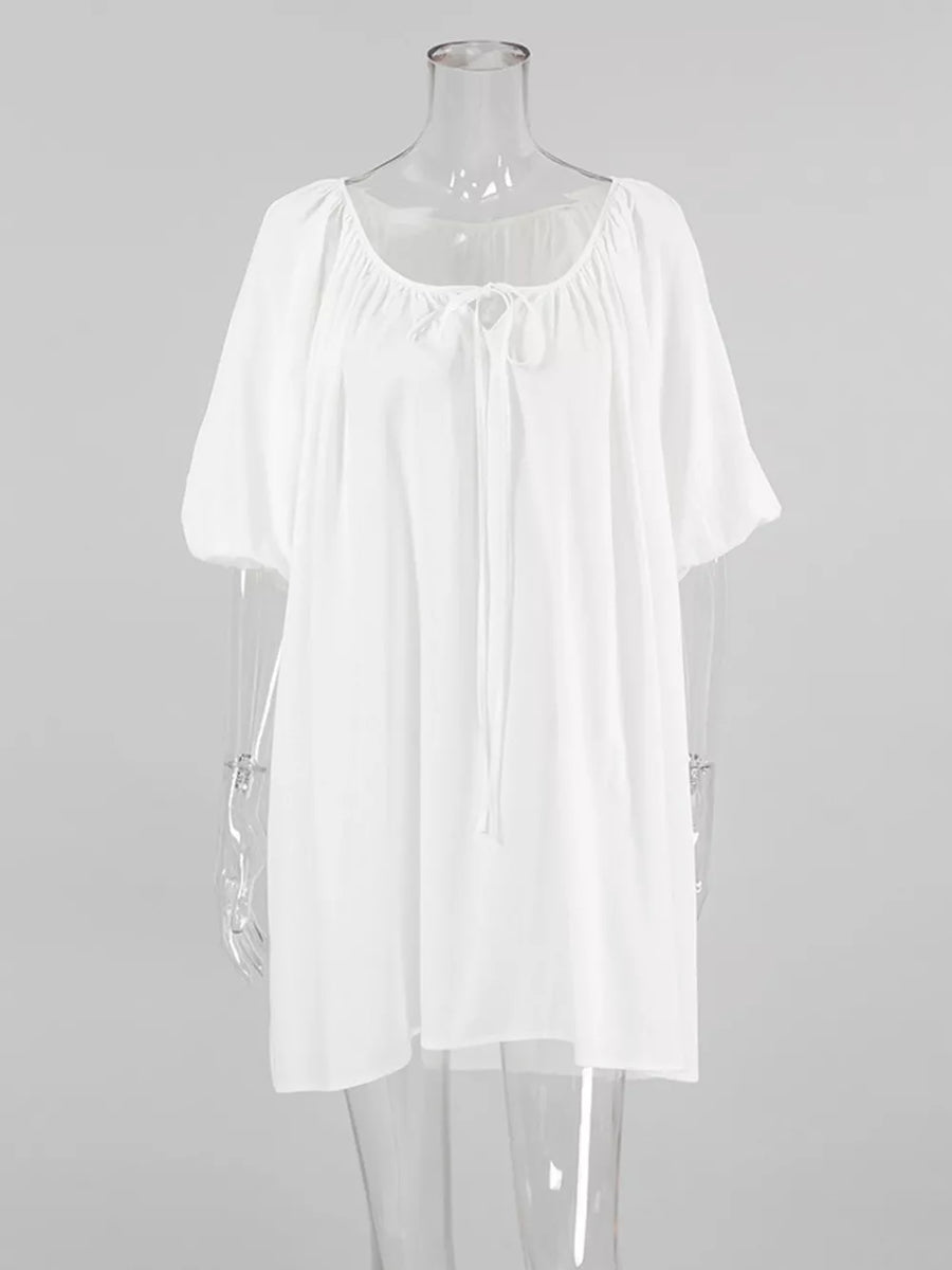 White mini dress with mini and tie