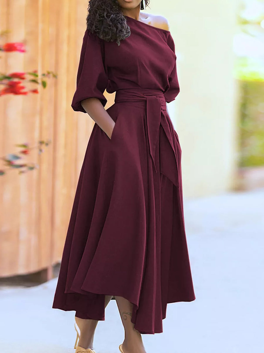 Burgundy off-the-shoulder belted dress with pockets and a tie waist, midi length.