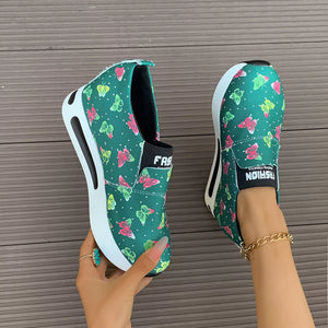 Green butterfly print round-toe slip-on shoes with air cushion and chunky sole.