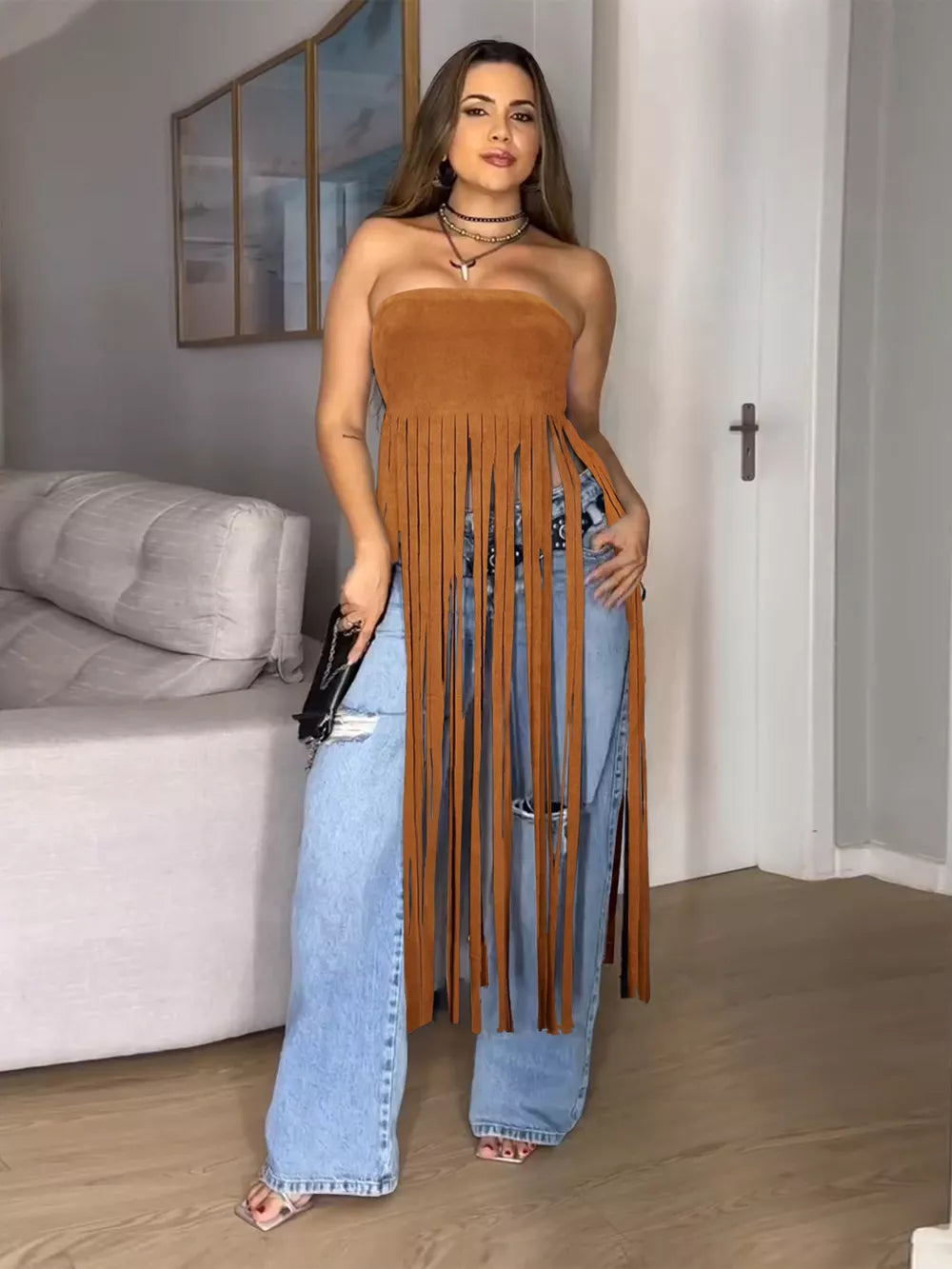 Bohemian caramel fringe trimmed tube top with a strapless neckline.