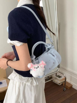 crossbody bag in pink with ditsy floral and ruched
