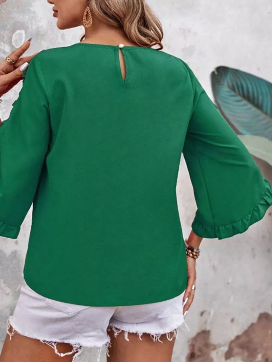 Green ruffled sleeve blouse with button detail and keyhole back.