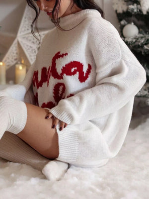 White oversized sweater dress with red graphic print, acrylic blend, mock neck, long sleeves.